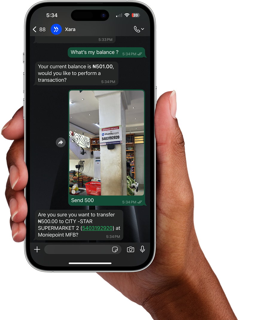 Image of a person using a phone using Xara whatapp chat
